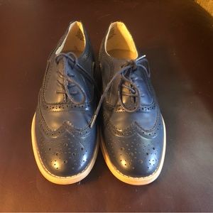 Never-worn blue Oxford flats in women’s size 8